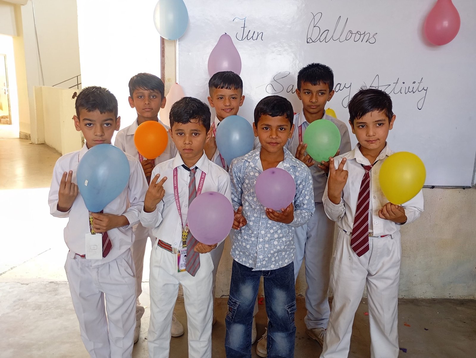 Primary students enjoying a classroom balloon activity at Shree Sai Public School, Karora.