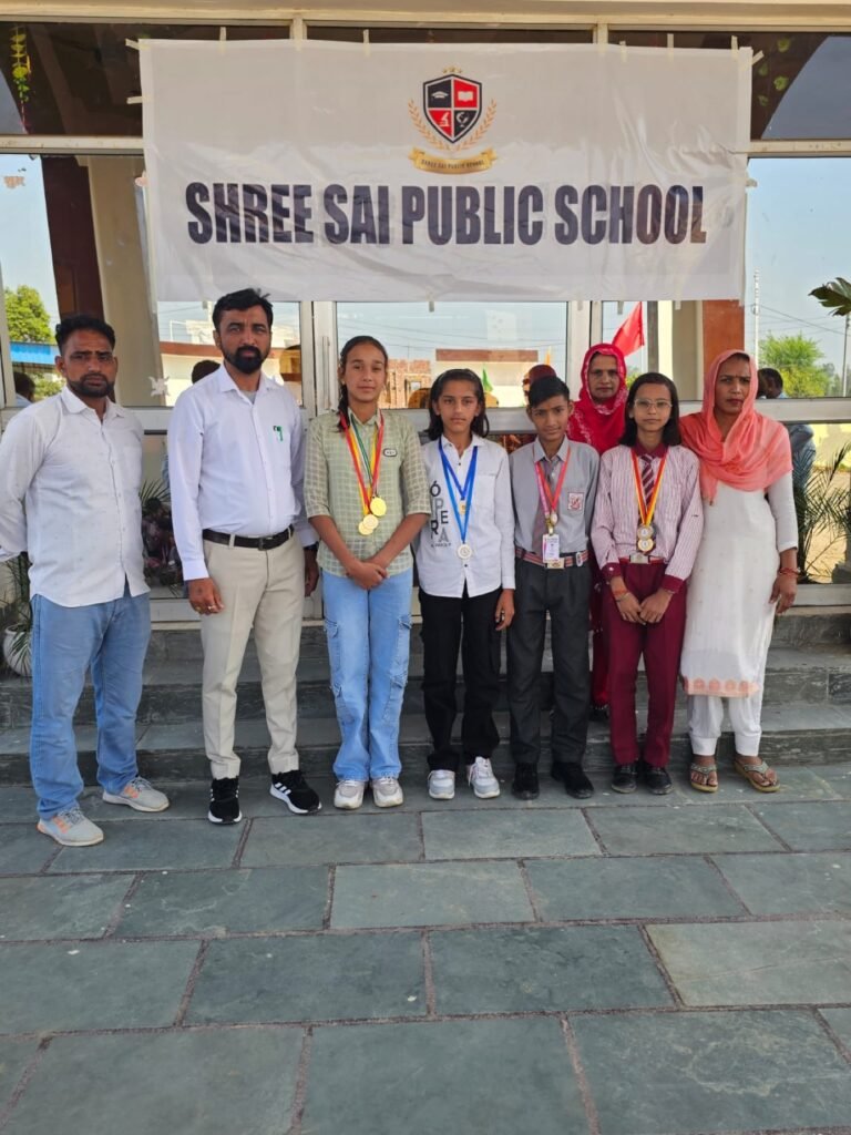 Student award winners with teachers at Shree Sai Public School, Karora.