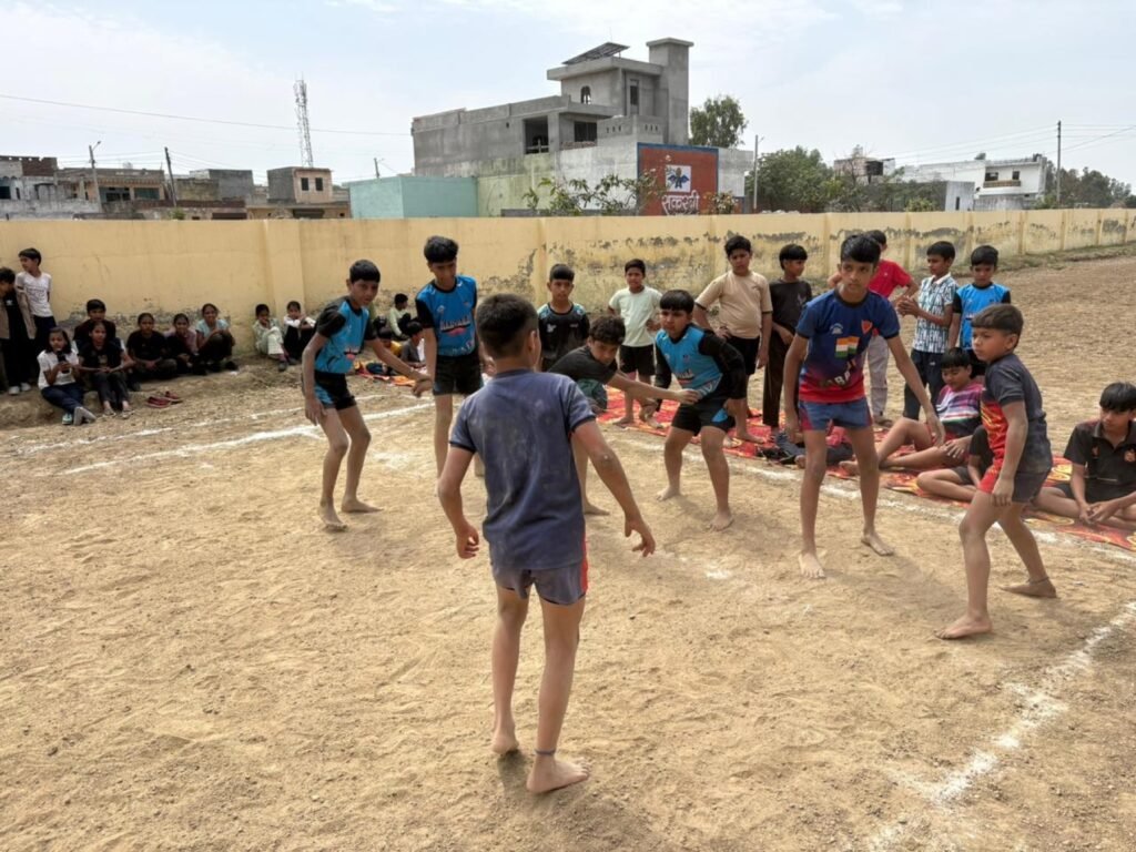 Students taking part in a school kabaddi match.